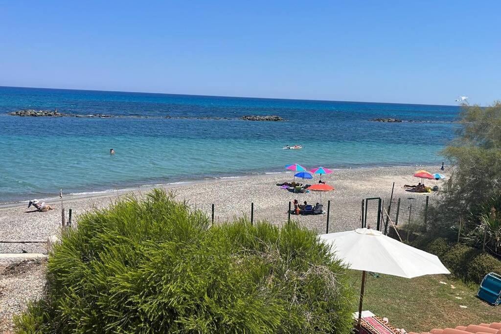 Paradise Beachfront Villa, Porto Columbu, Sardinia Porto Columbu - Perd'E Sali Eksteriør billede