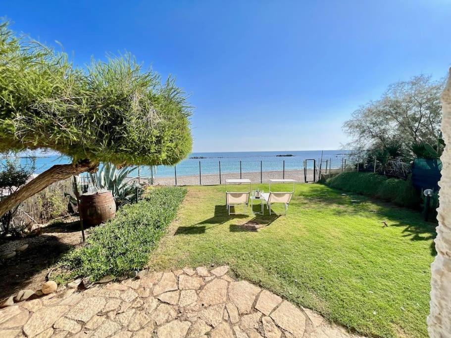 Paradise Beachfront Villa, Porto Columbu, Sardinia Porto Columbu - Perd'E Sali Eksteriør billede